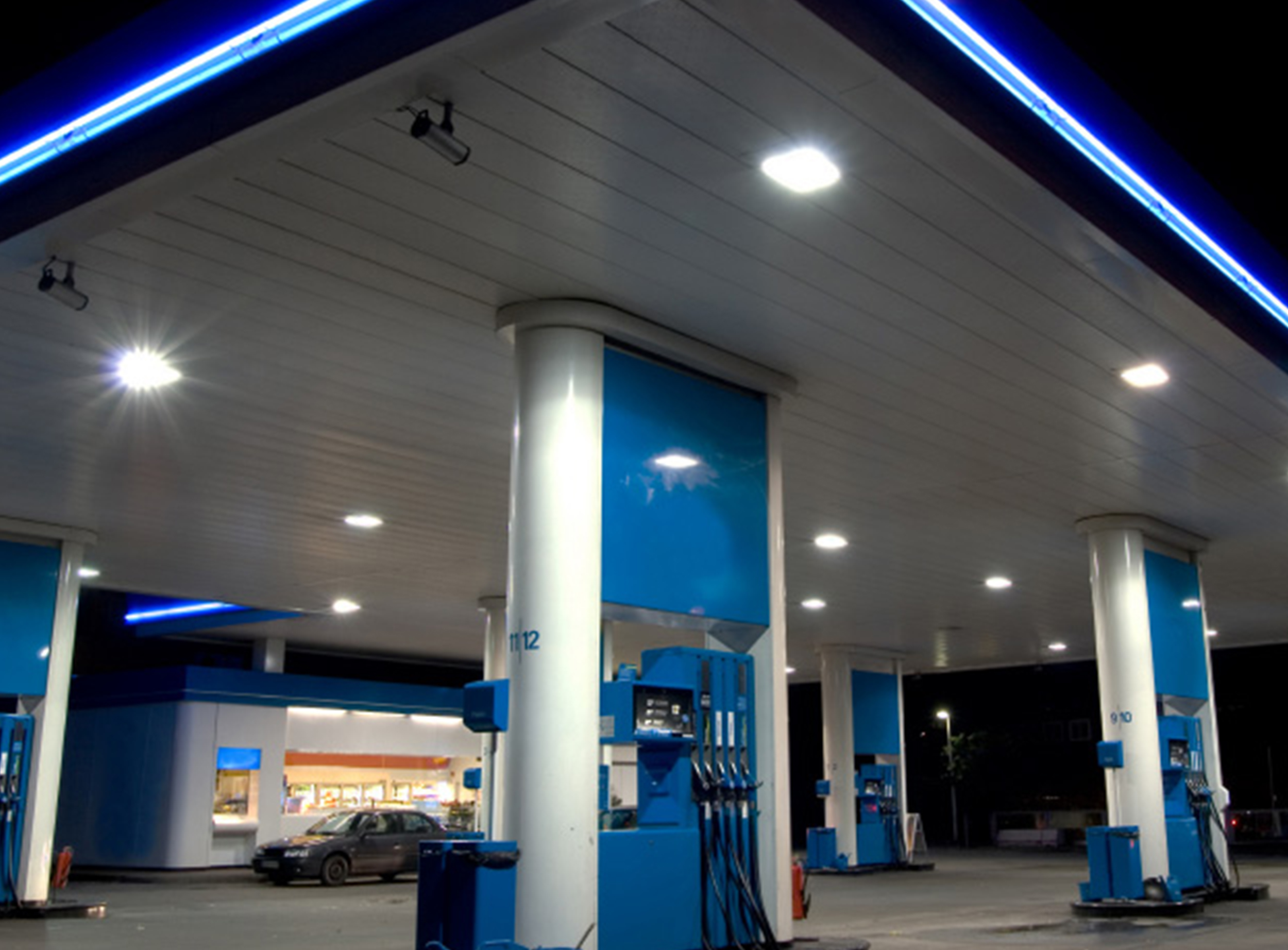 image of gas station at night