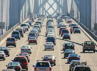 image of vehicles crossing over large bridge