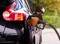 image of gas being pumped into vehicle