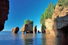 image of stone figures in water